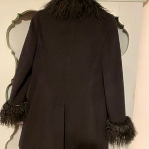 Short black wool and fur edged coat